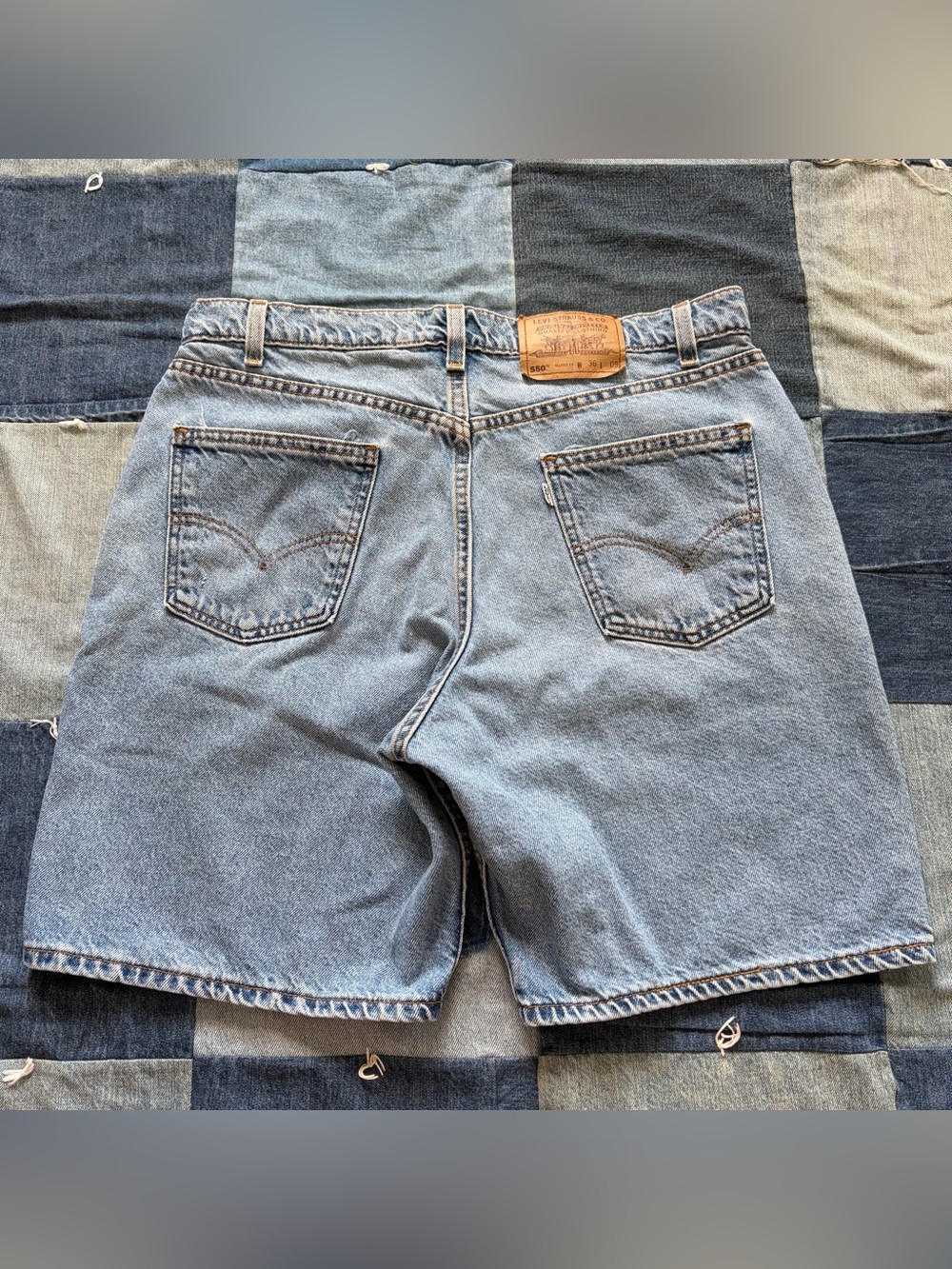 vintage 90s levi’s 550 denim shorts relaxed baggy light wash jorts 35x8 usa made